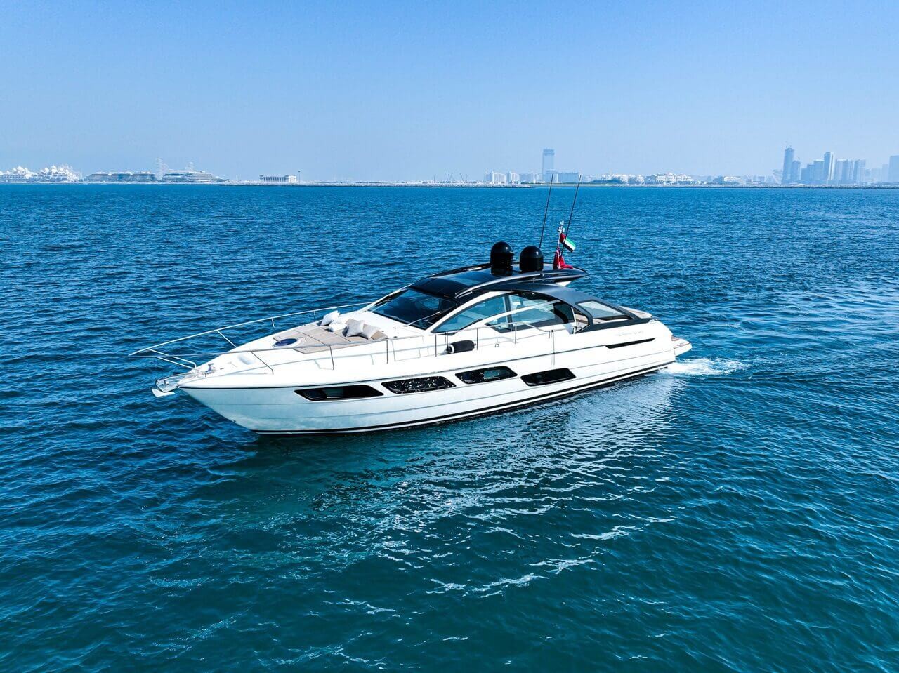 Pershing 5X Pearl White 52 ft sport luxury yacht Dubai — up to 8 guests VIP charter AED 2,400/hr